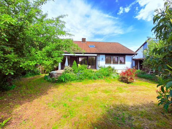 Einfamilienhaus mit Bungalow-Charakter, Südgarten, Sauna, Garage und Einlieger-Potenzial