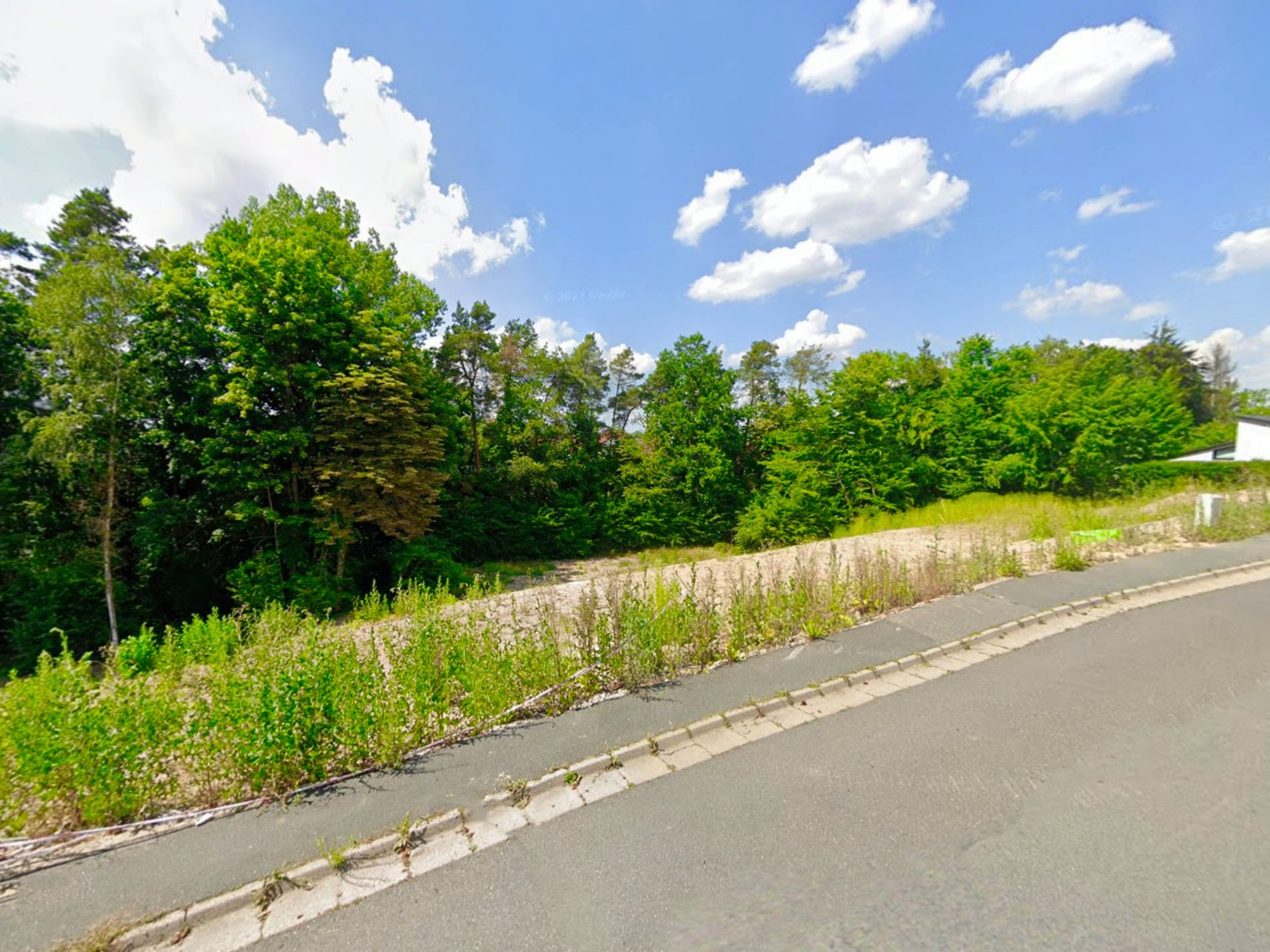3 erschlossene Baugrundstücke mit Fernblick, Hanglage und Bauvorbescheid für Mehrfamilienhäuser